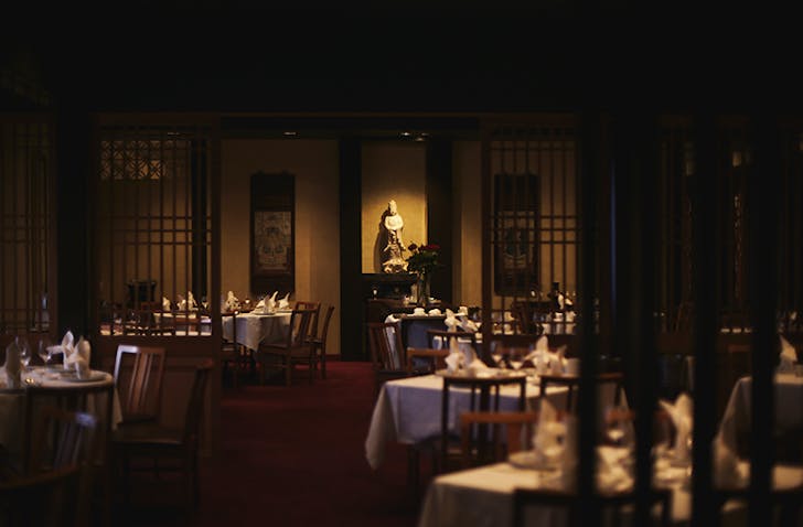 A dimly lit interior of one of the best Chinese restaurants in Melbourne.