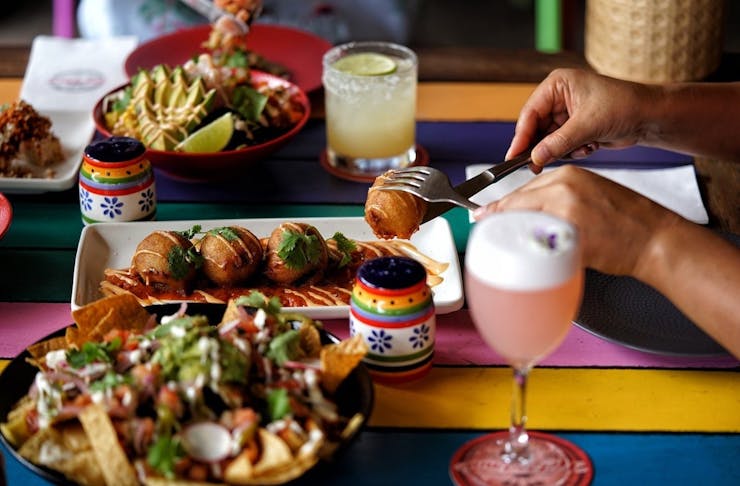 A table full of Mexican eats at Hot Tamale in Darwin
