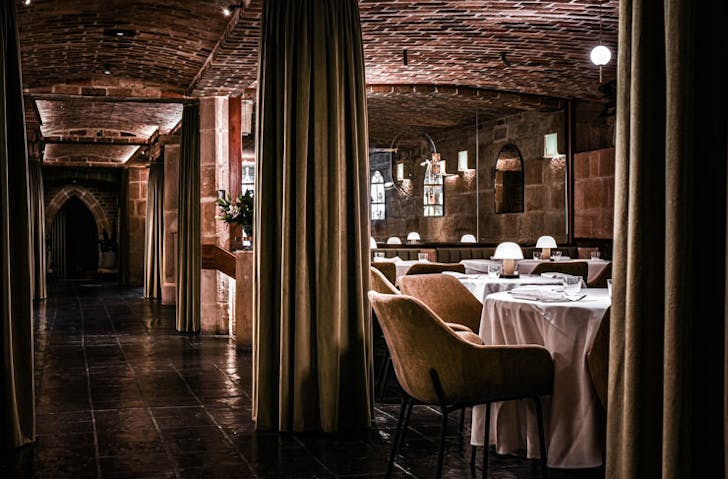 The moody lamplit dining room at Beckett's. 