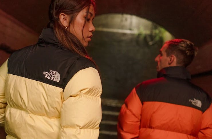 Models wearing The North Face puffer jackets