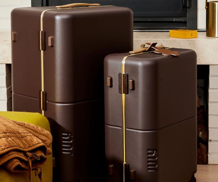 Brown suitcases from July luggage which are on sale for the EOFY sales in 2024