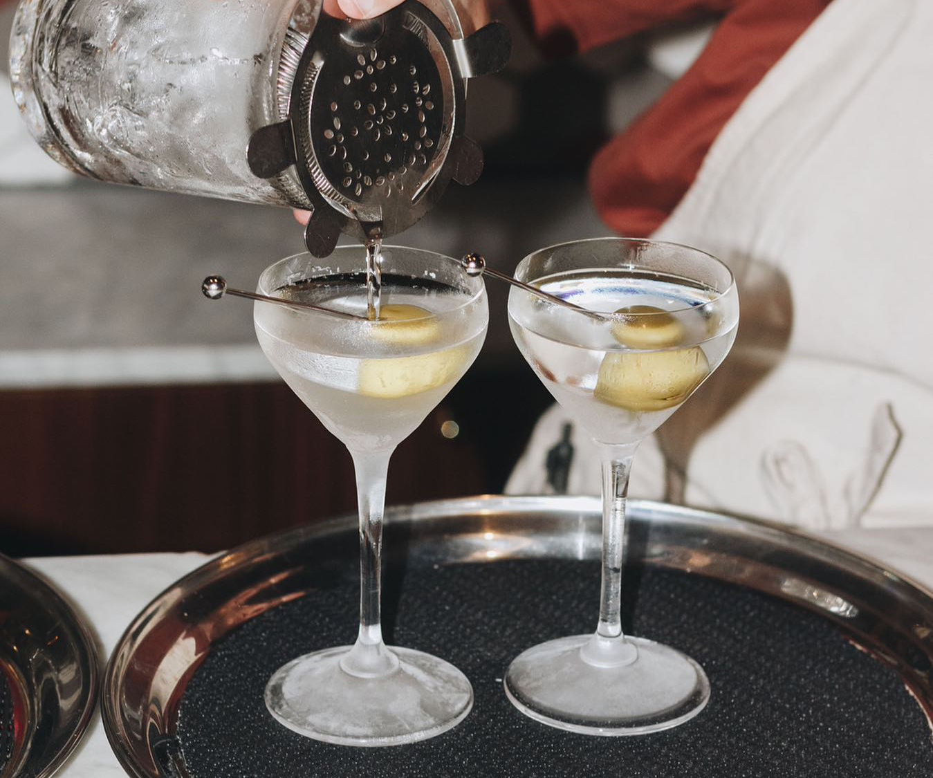 Two martinis being poured at Jane, one of Sydney's best happy hours