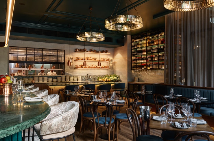 Velvet booths and a green marble bar at Maydanoz Sydney