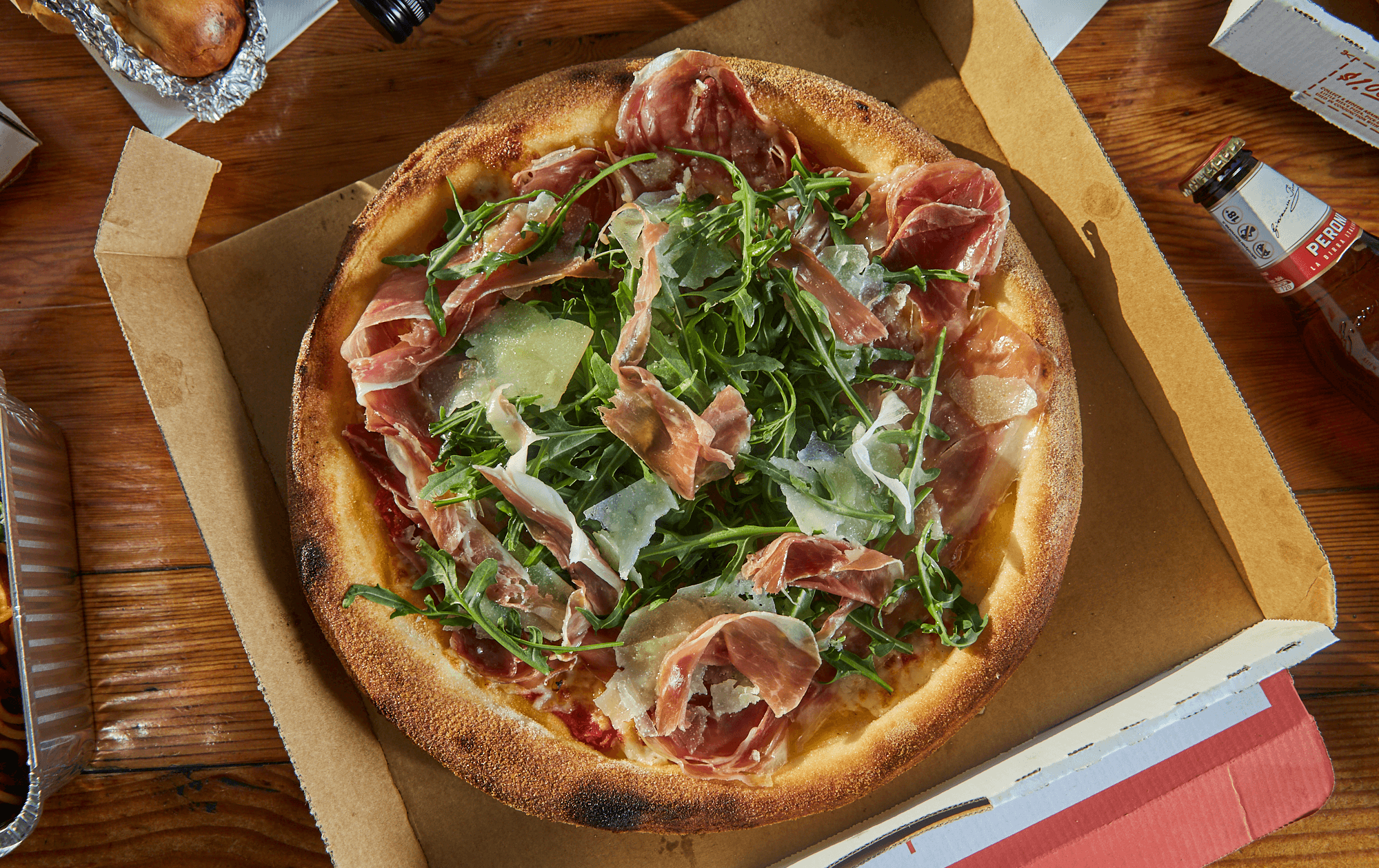 A prosciutto covered pizza at Rita's Pizza in Melbourne.