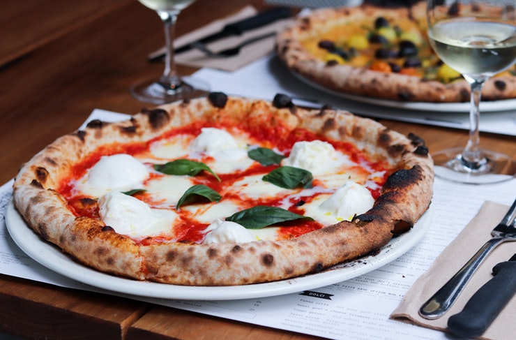 A pizza in from Melbourne's DOC, covered in buffalo mozzarella.