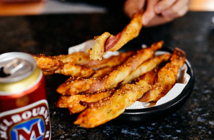 Cheese and bacon twists in a bowl