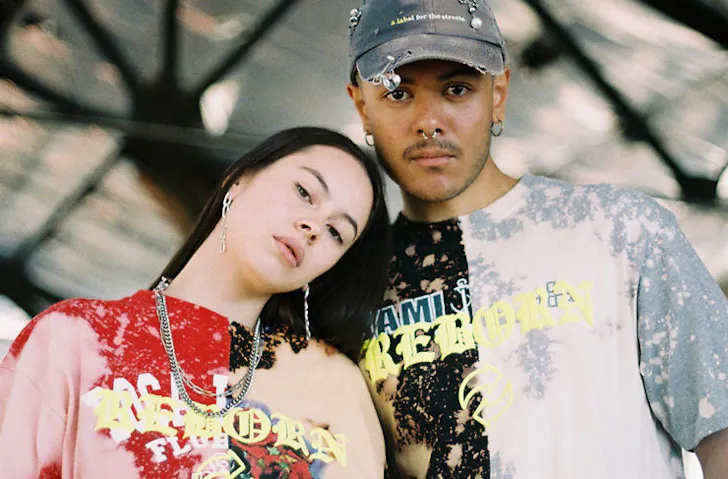 Models wearing brightly coloured t-shirts from REBORN by HoMie. 