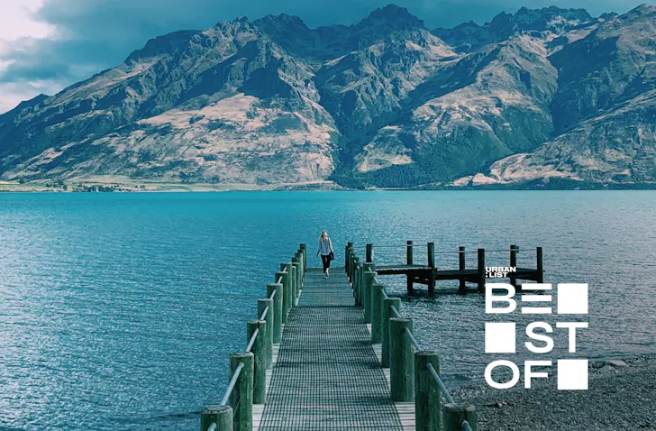 Someone walks along the pier in Queenstown.