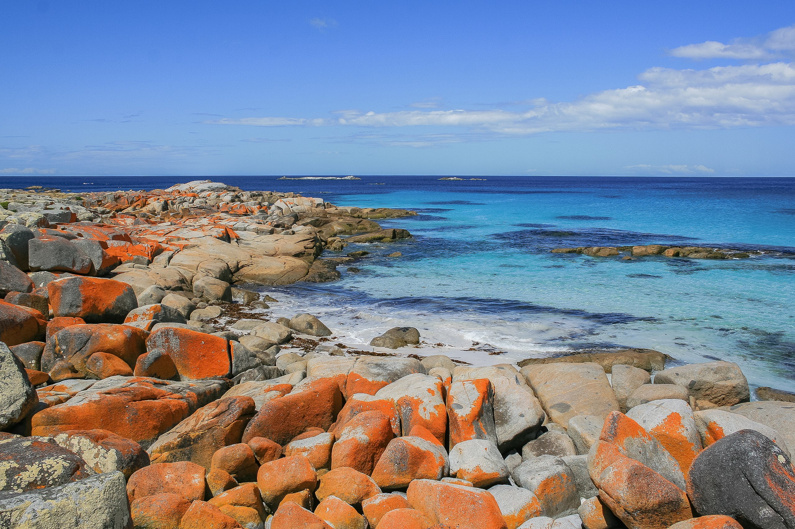 The stunning orange rocks at the Bay of Fires.