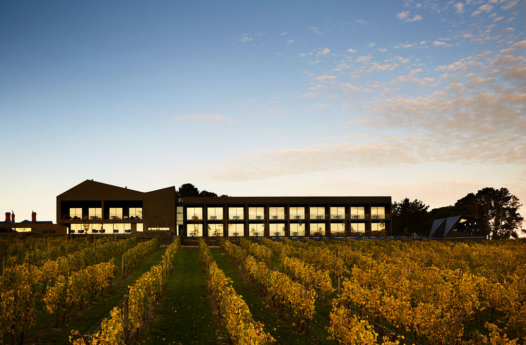 External view of the imposing Jackalope building at dusk.