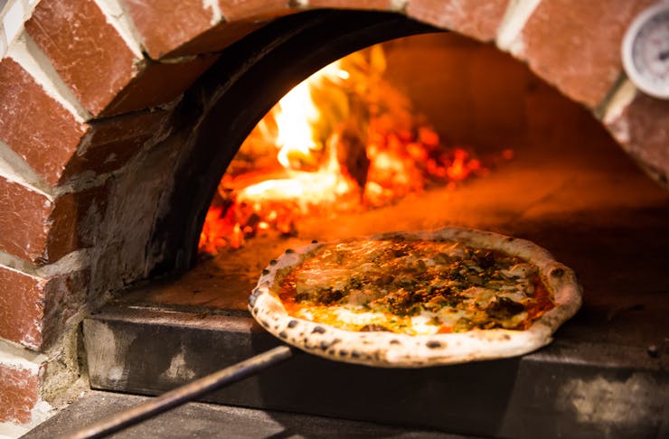 Wood-fired pizza indulgence at Olympia pizzerias