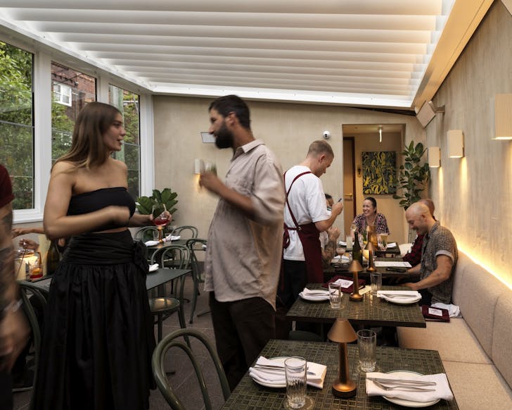 people in the rooftop dining space at the waratah darlinghurst