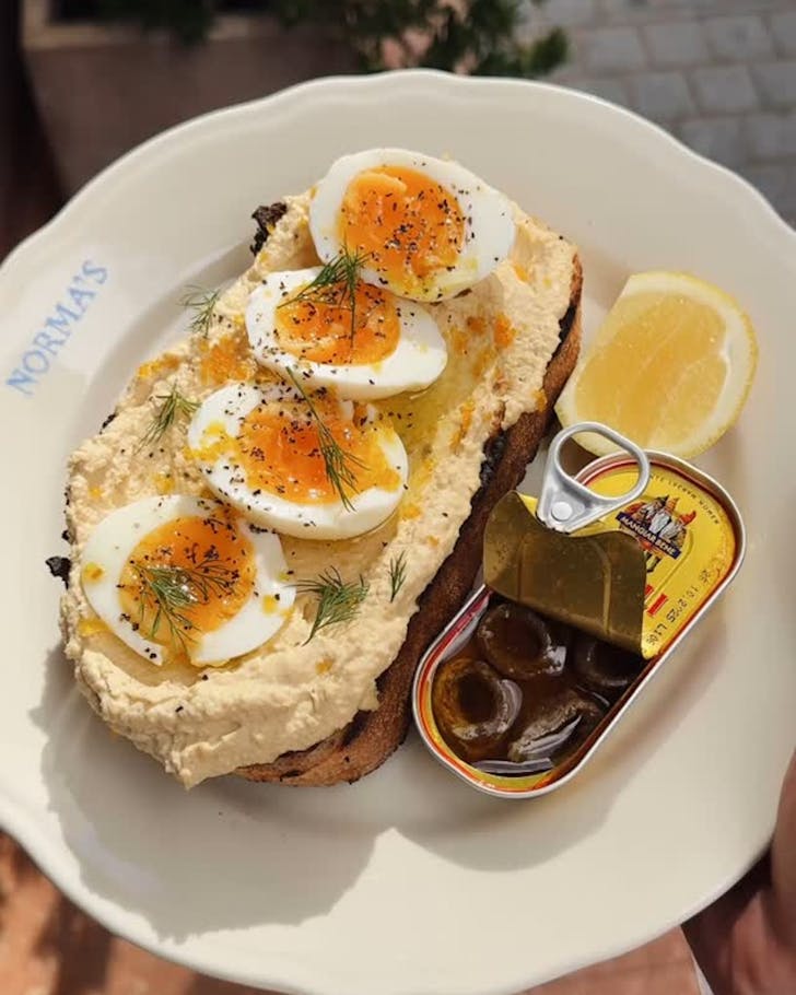 a plate of eggs on toast at norma's deli cafe in manly