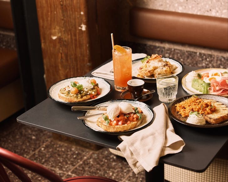 a spread of breakfast dishes at tessuto, a cafe in the sydney cbd