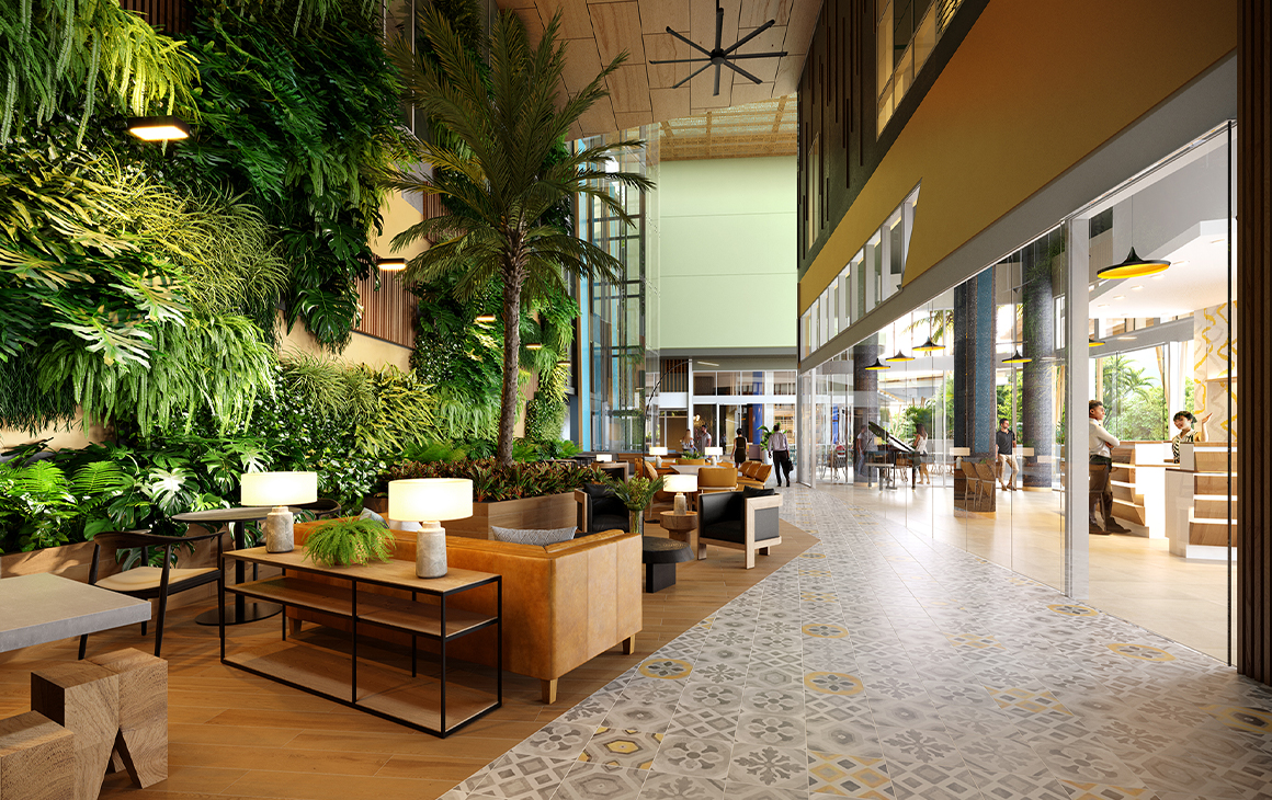 a plant covered hotel lobby