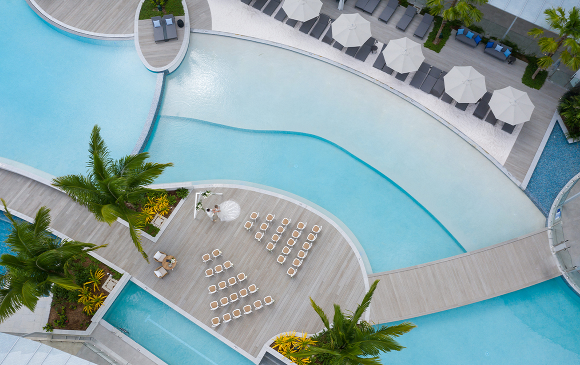 an aerial view of a resort pool