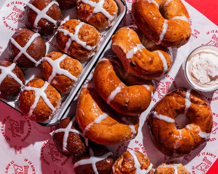 a platter of bagels and hot cross buns from sydney bakery brooklyn boy bagels
