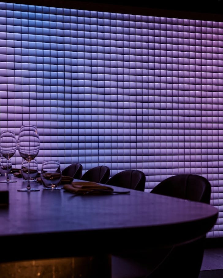 a vibrant purple installation at kaiseki restaurant garaku