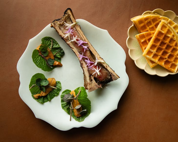 a bone marrow and waffle dish at kiln in surry hills