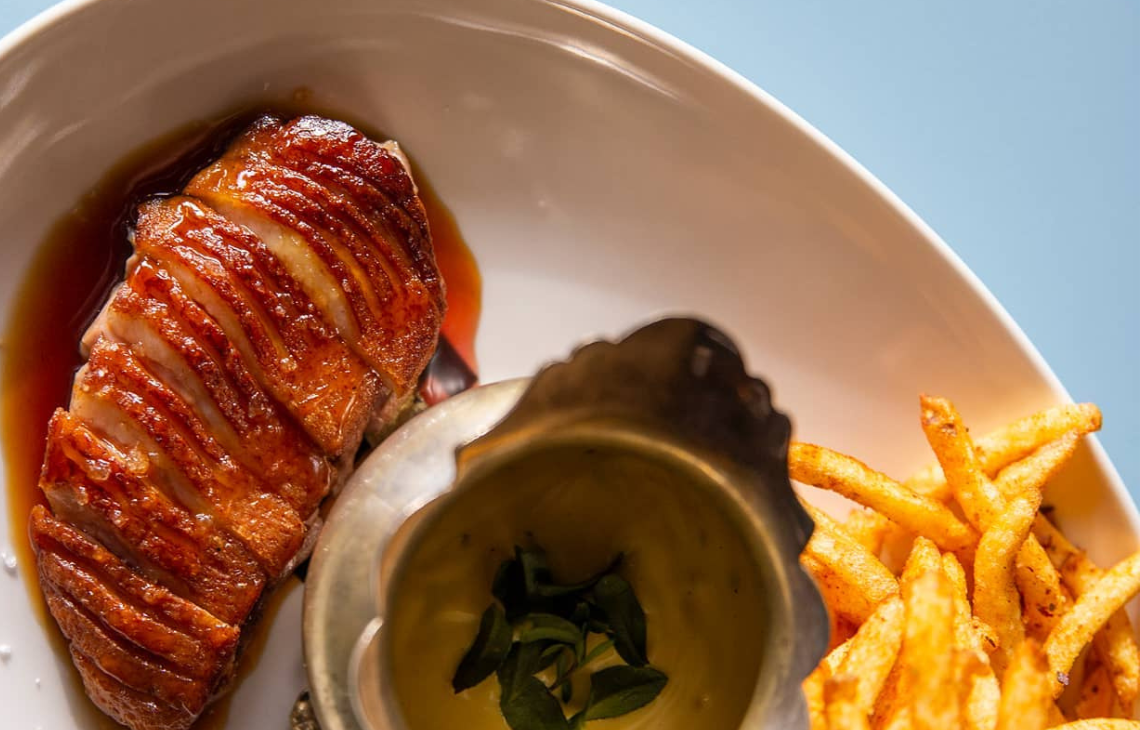 Glazed wagin duck with frites from Le Rebelle