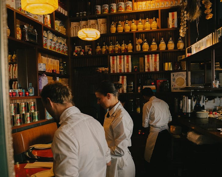 waiters at the bar inside surry hills italian restaurant pellegrino 2000
