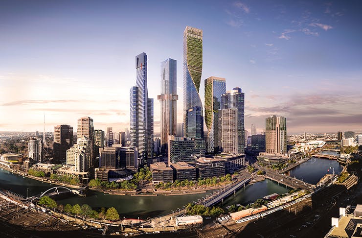 The Melbourne city skyline with a render of a green building in the middle.