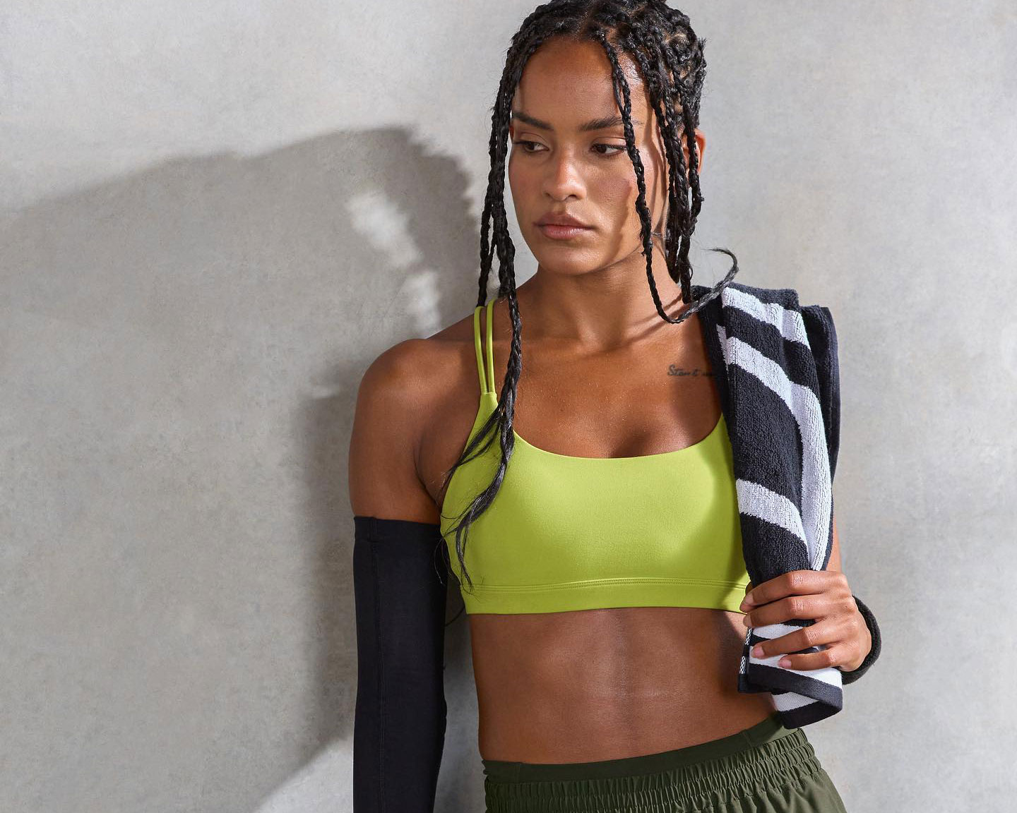 A model wearing brightly coloured Lorna Jane activewear, which is on sale for Black Friday 2023