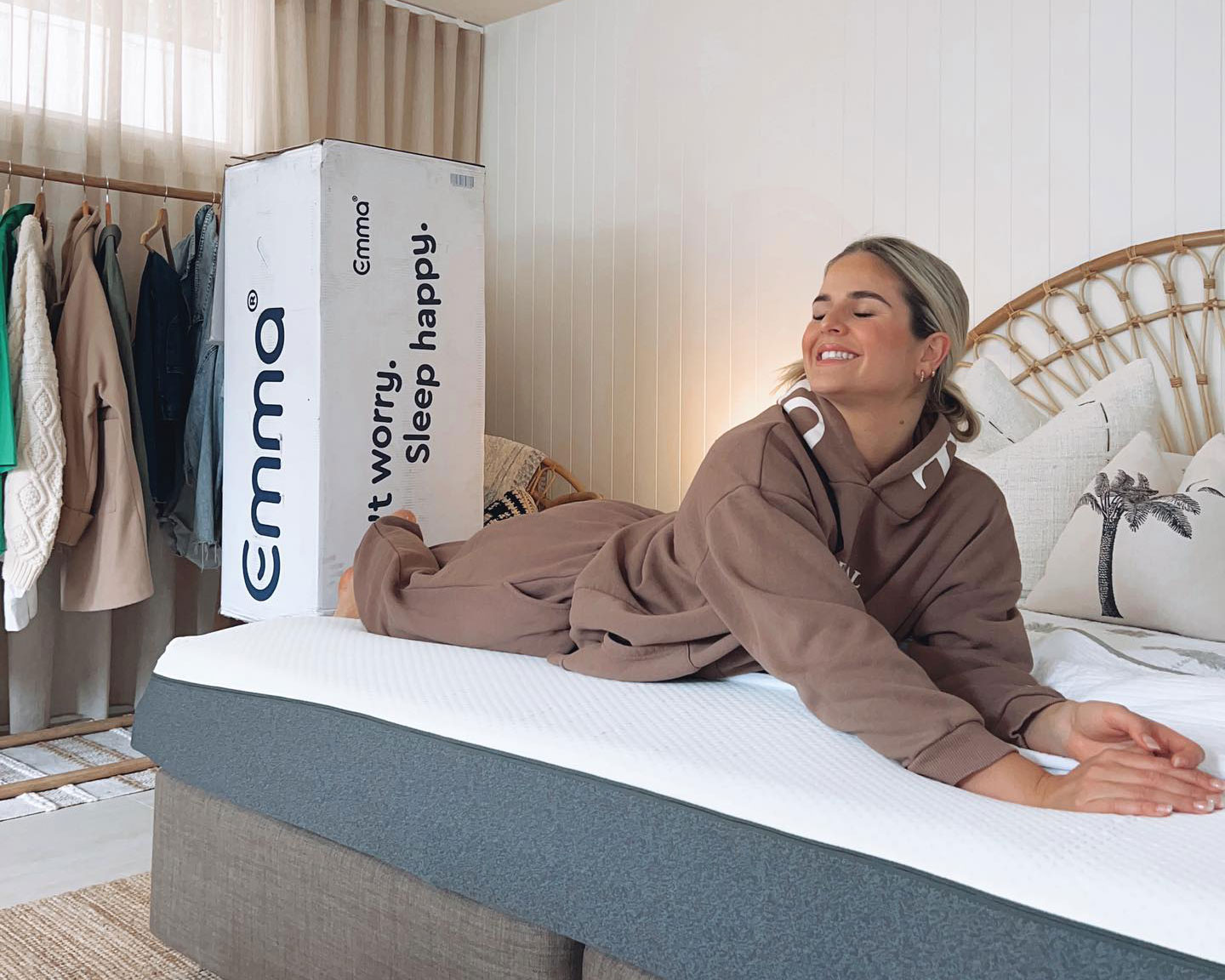 A person on an Emma mattress, which is on sale for Black Friday