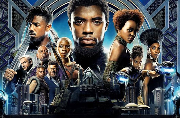 The characters from Black Panther, including the late Chadwick Boseman, in the centre of the image.