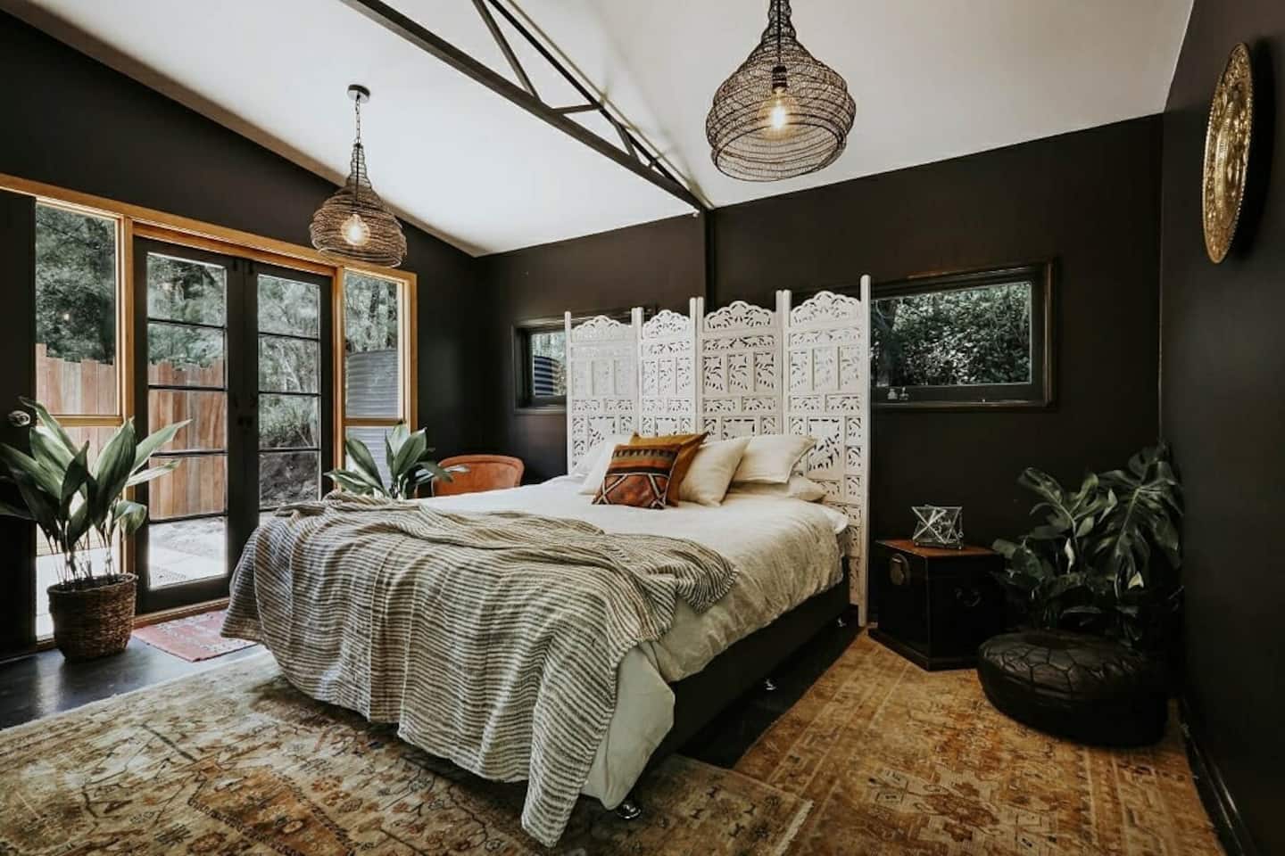 a dark, Moroccan-inspired bedroom