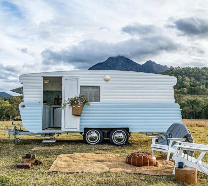 a blue vintage caravan