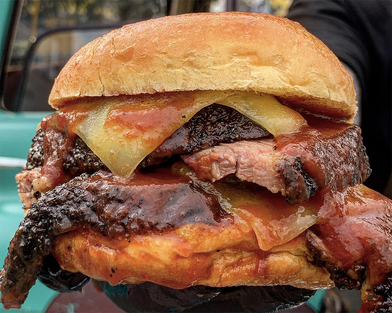 A loaded brisket burger from Blue Ox Babe BBQ, one of the best American food joints in Auckland.