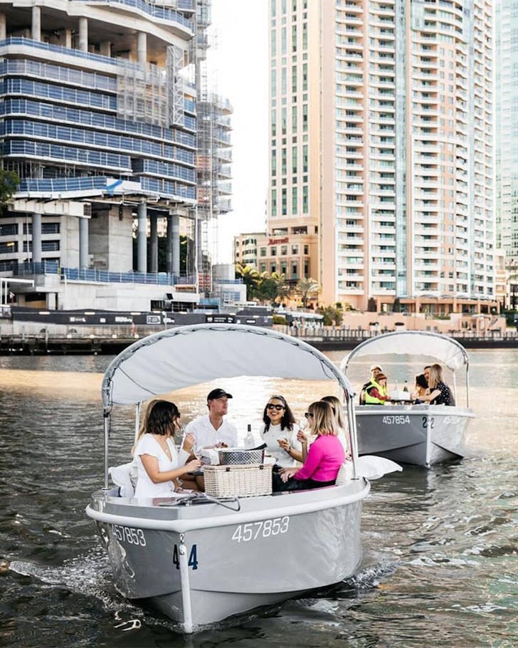 People on boat in the Brisbane River