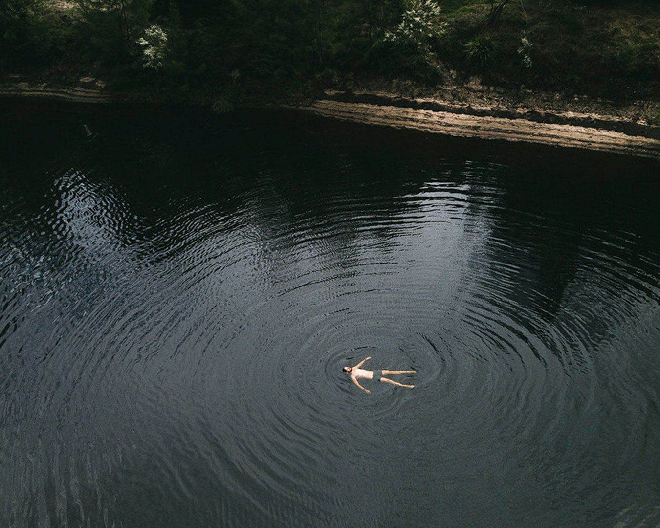 Person floating in water