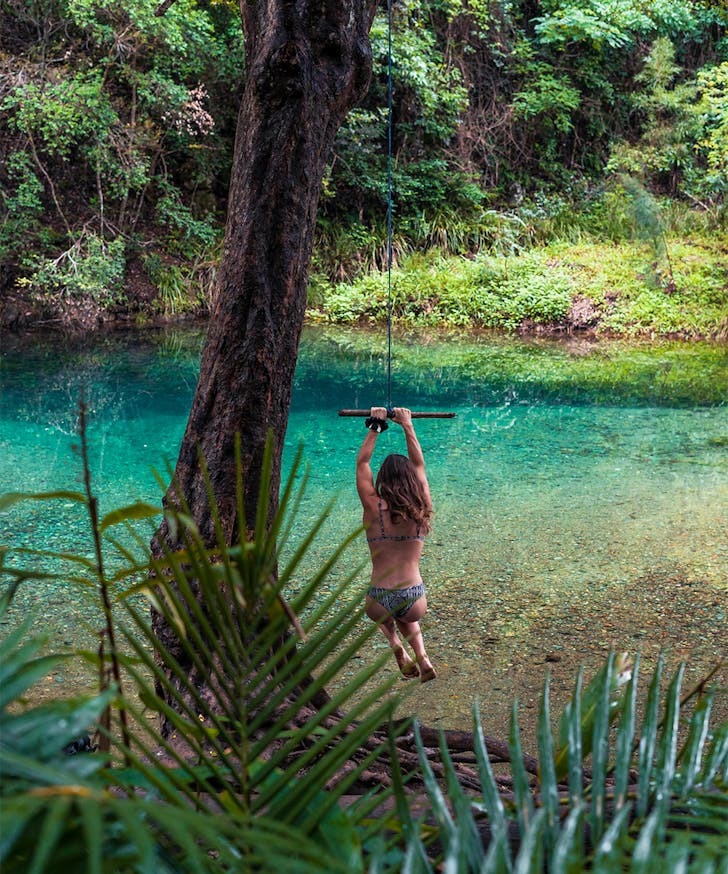 a person on a rope swing