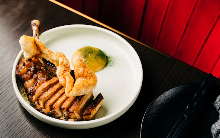 pork tomohawk sliced into pieces