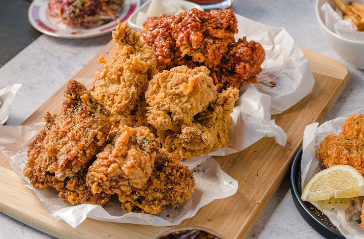 a platter of fried chicken pieces