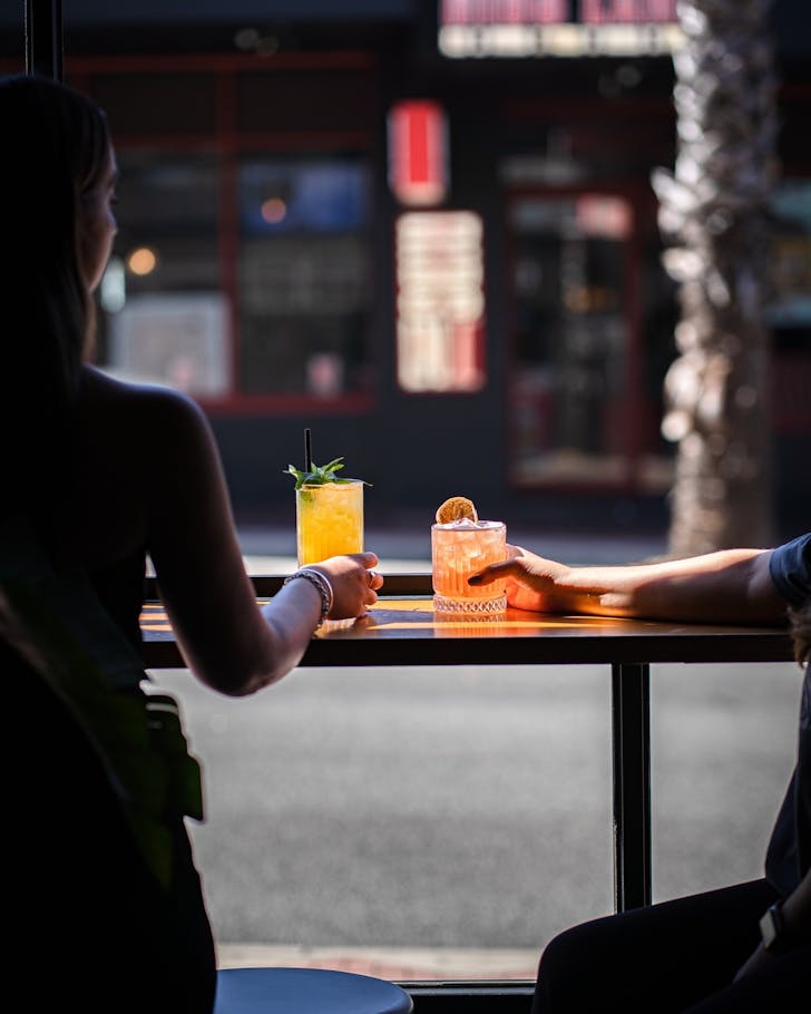 âFriends clinking colourful cocktails at Good Company Bar Perth during bottomless brunch.â