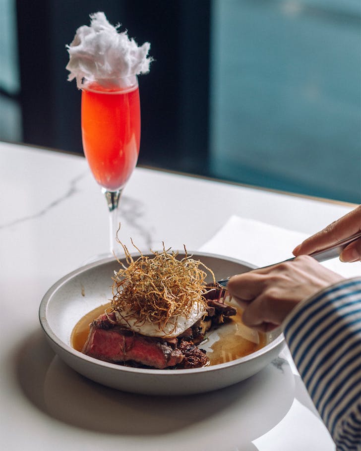 a Brisbane bottomless brunch of steak and eggs and a cosmo at Mr Duncans