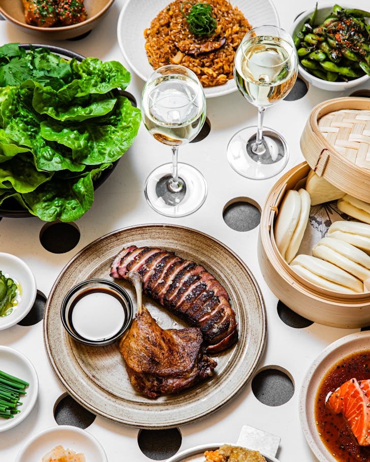 bao buns and glasses of sparkling wine at cho cho san's bottomless brunch