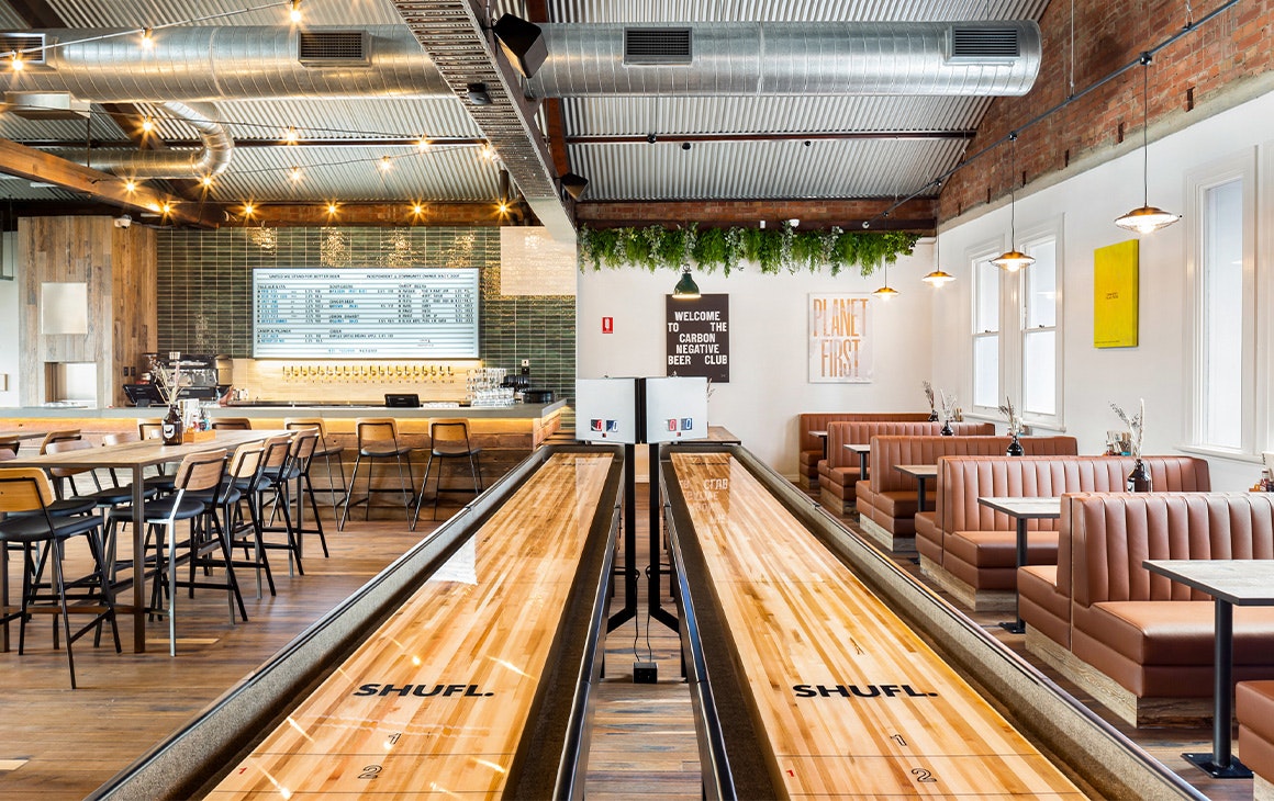 upstairs bar with shuffle tables