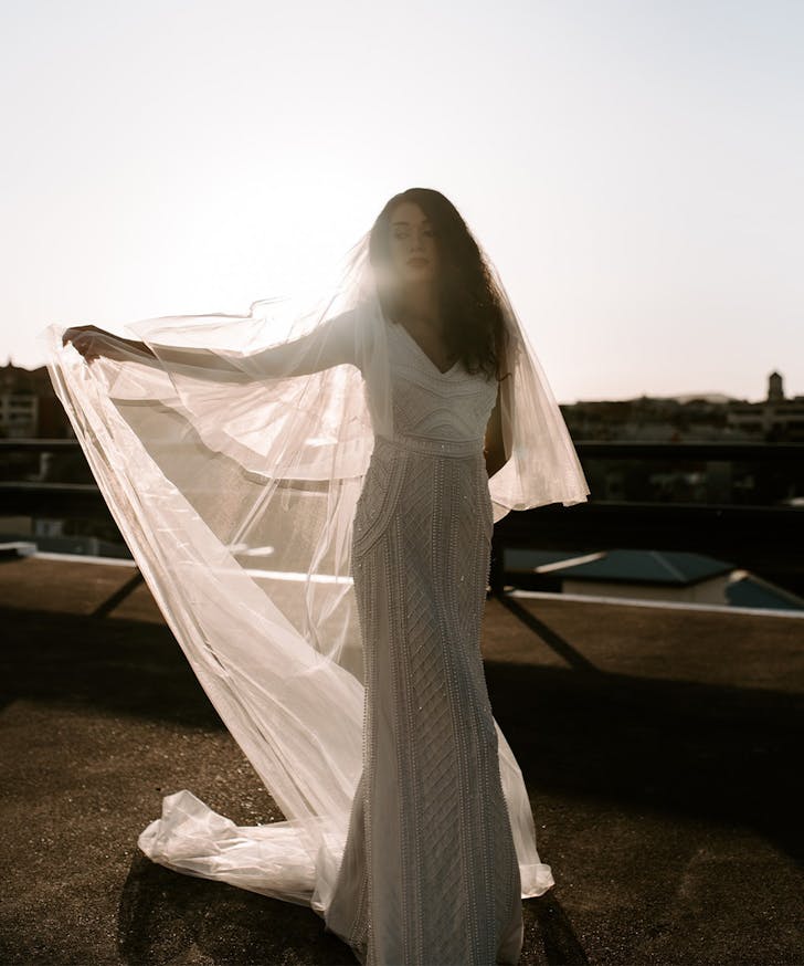 a woman in a wedding dress from a brisbane bridal boutique