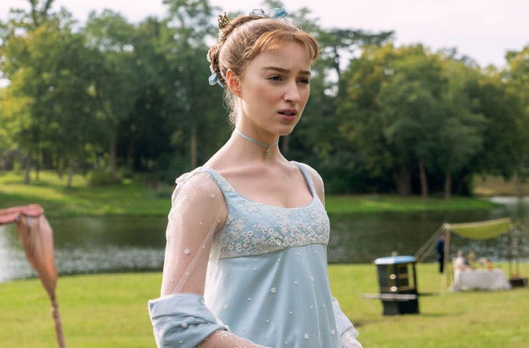 Daphne Bridgerton from the series Bridgerton in a blue Regency-era dress. 