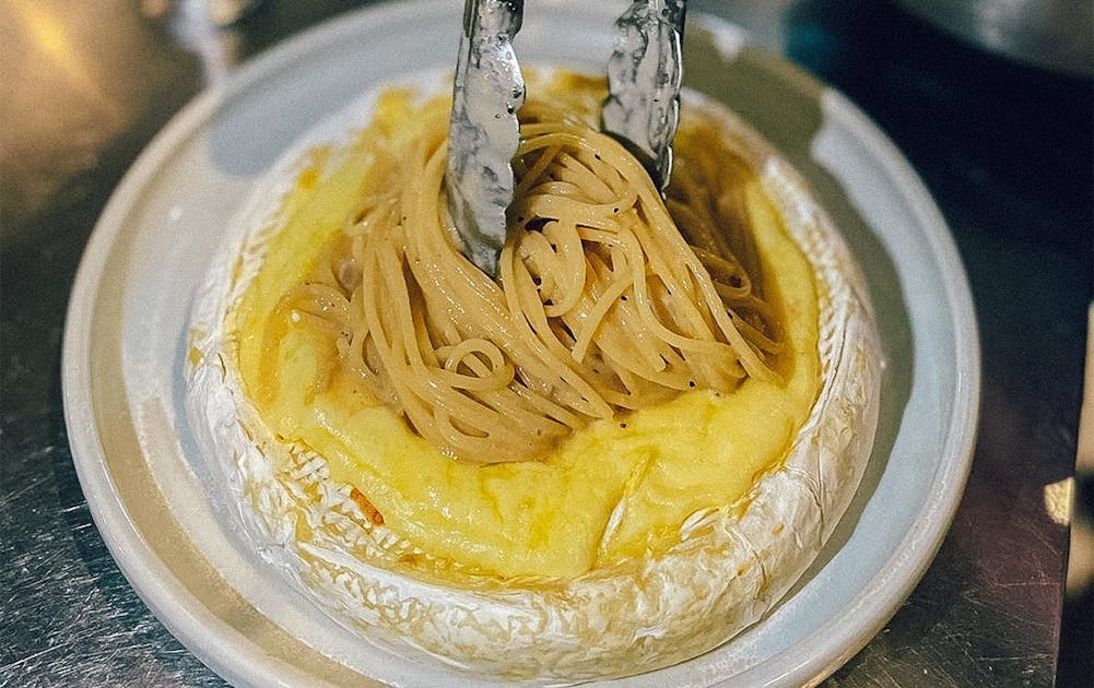 This Italian Joint Is Dishing Up Spaghetti In A 1kg Wheel Of Melted Brie |  URBAN LIST BRISBANE