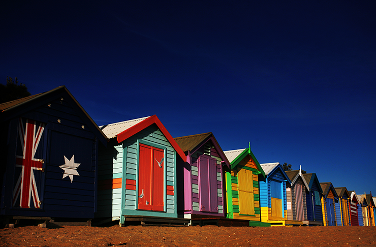 A cluster of colourful beach boxes at one of the best beaches in Melbourne.
