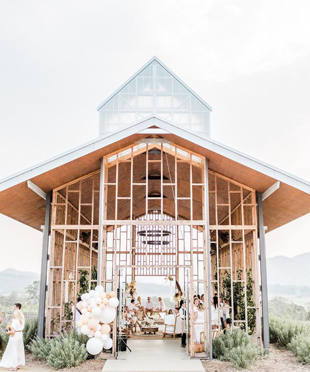 a barn-like building in a lavender field a kooroomba, a wedding venue near brisbane