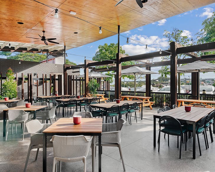 a terrace dining area at browns plains hotel, a brisbane pub with a playground