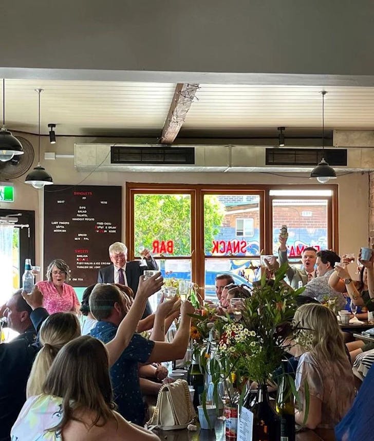 people cheers at sydney byo restaurant emma's snack bar