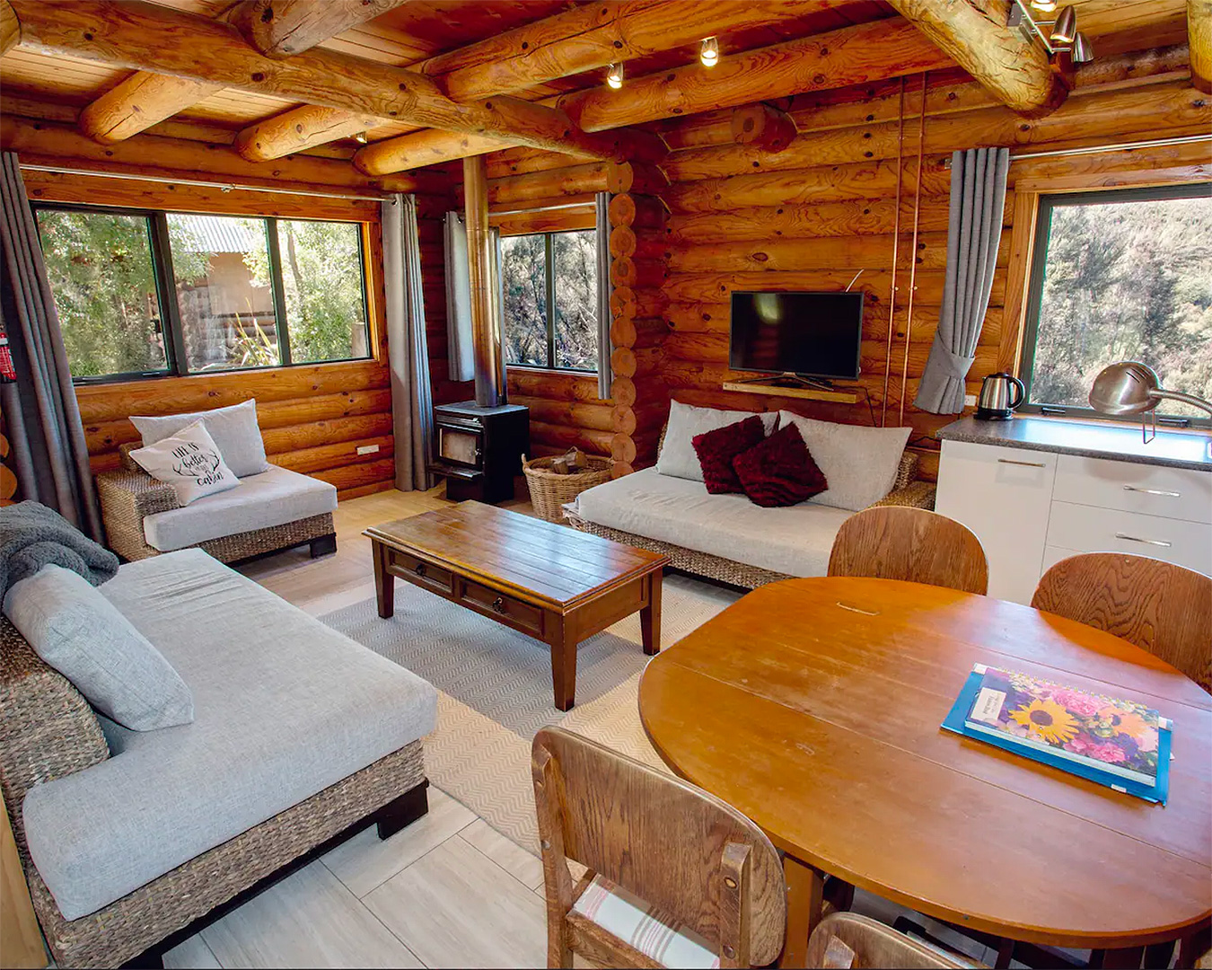 The wooden interior of the stunning cabbage tree cabin, one of the best places to stay near Hanmer Springs.