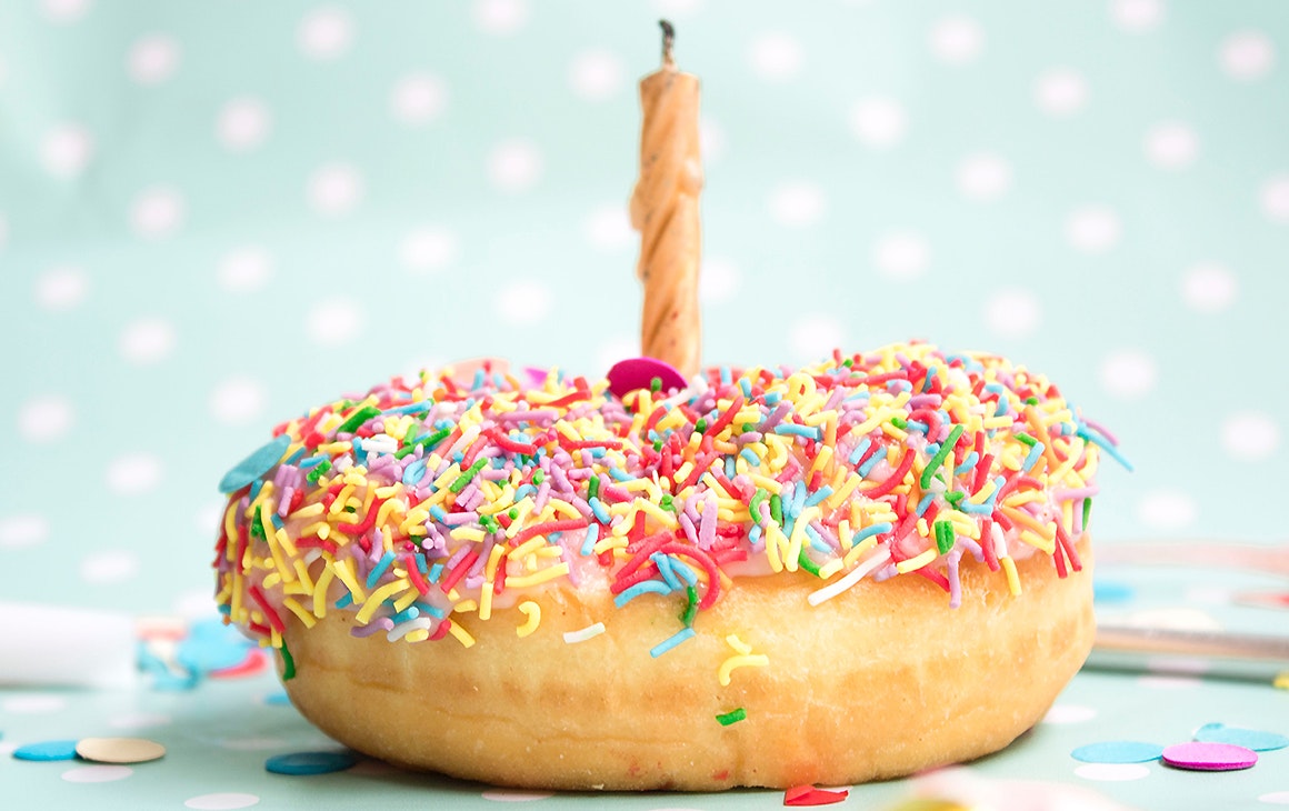 A doughnut with a candle